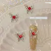 Joyería de uñas nueva de网红 aleación mariposa líquida mariposa plateada estéreo cuadrado de diamante decoración de uñas de diamante al por mayor