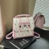 Mochila de estilo coreano para mujer con lazo, moda de principios de primavera, versátil, moderna, linda, casual, bolso de mano para el día a día