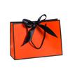 Bolsa de papel portátil con lazo de color, de fondo cuadrado, con embalaje exquisito, para regalo, ropa, compras, logotipo imprimible.