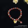 El nuevo brazalete de cristal de mariposa simple moda color pequeño fresco cadena de mano para mujer puesto venderá en vivo lote de regalo