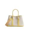 Bolso de mano de cuero de alta gama para mujer de Niche, con capa superior de piel de vaca, lona de gran capacidad y diseño de jardín en contraste.