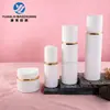 Set de botellas redondas de vidrio en stock 30-120 ml, botella dispensadora de loción 30g 50g, materiales de embalaje para set de botellas de crema y contorno de ojos