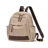 Mochila de nailon moderna y a la moda, mochila versátil para viajes transfronterizos, bolso casual para mujer, nuevo bolso para mujer 2025 al por mayor