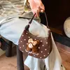 Bolsa Casual Fofa Nova para o Dia a Dia 2026 Moda Feminina Superfície Macia Estilo Coreano Design de Nicho Bolsa de Ombro Único Transversal Dumpling