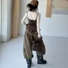 Conjunto de Primavera y Otoño para Niñas 2026 Nuevo Casual Estilo Coreano para Niñas Mayores, Top Falso de Dos Piezas con Falda y Pantalones Cargo