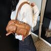 Bolsa de ombro feminina casual retrô, bolsa de ombro feminina de inverno 2025, nova bolsa de ombro portátil de nicho em estilo coreano para deslocamento
