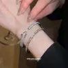 Pulsera Súper Brillante de Zirconia y Nácar con Forma de Serpiente, Lujo Ligero, Gama Alta, Elegante, de Nicho, Exquisita, Joyería de Mano Impresionantemente Hermosa
