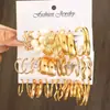 Nuevo Juego de Pendientes de Estilo Europeo y Americano con Rayas Trenzadas, Diseño Retro Geométrico, Sensación Simple y de Alta Gama, Juego de Pendientes de Botón de Nueve Piezas para Mujer