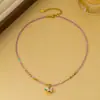 Collar vintage versátil exquisito de esmalte de doble cara con pony y cuentas de piedra natural para mujer, cadena de clavícula de nicho de lujo ligero de alta gama