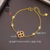 Pulsera de calabaza mariposa oro antiguo de alto color láser tienda de oro con joyería flash nicho lujo cuatro hojas