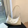 Bolsa Baguete Simples Retro para Carregar na Mão para Mulheres 2025 Novo Estilo de Inverno Estilo Estrangeiro Elegante Tendência Versátil Bolsa de Ombro Único Transversal
