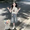 Conjunto de Verano para Niña 2026 Estilo Nuevo Niña Grande Camiseta de Manga Corta Estilo Coreano Infantil Pantalones de Mezclilla Anchos de Verano