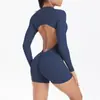 Mono de yoga con espalda hueca, traje de yoga de una pieza de manga larga y shorts para fitness deportivo de alta intensidad, secado rápido dopamina