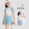 Traje de Banho Infantil Infância Feliz: Maiô Conservador Estilo Saia-Calcinha Macaron Menina Energética com Bojos para Meninas, Adequado para Férias