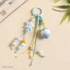 Llavero de fresa estilo ins de Jingdezhen, colgante de cerámica para bolso estilo étnico, accesorios artísticos de puesto de mercado nocturno, suministro del fabricante
