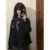 Suéter de moda de estilo coreano, diseño de nicho con corbata de lazo y patchwork, combinado con un conjunto de falda de lunares para estudiantes en otoño