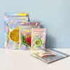 Bolsa autosellante de láser Bolsa de hueso de sellado de colores translúcidos para joyería Bolsa de embalaje flash arcoíris Yin y Yang Bolsa de sellado brillante
