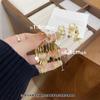 Brincos de borla murcha dourados brilhantes de outono e inverno para mulheres, leves, luxuosos, elegantes, brincos elegantes, brincos de orelha, chuveiro de rosto, fivela pequena para orelha