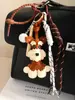 MIU Linda Bolsa de Perro Schnery PU Versátil Colgante Llavero de Coche Cuerda Trenzada de Amor Béisbol Colgante