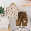 Traje de Verano para Niños 2025 Nuevo Ropa Casual de Dos Piezas de Manga Corta para Niños Bebé Moda de Comercio Exterior