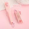 Mini peine plegable portátil con forma de corazón rosa para niña, peine creativo de dientes suaves, peine de plástico, peine con cojín de aire