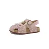 Zapatos para bebés y niños pequeños Zapatos de un solo color con lazo francés Sandalias Mary Jane de verano 2026 nuevas para niñas con punta redonda