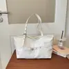 Bolsa feminina grande capacidade em couro encerado retrô 2026 nova bolsa de ombro casual de alta qualidade com pregas para o dia a dia
