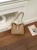 Bolso cruzado casual de diseño de nicho estilo coreano de alta gama para mujer, nuevo y elegante bolso de hombro para el trabajo de verano 2026 para mujer