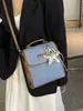 Bolsa de Ombro de Nicho de Moda Transfronteiriça Pequena Bolsa de Mão para Mulheres 2026 Novo Verão Retro Versátil para o Dia a Dia Bolsa Transversal