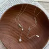 Collar de borla de perlas de plata de ley S925 para mujer, cadena de clavícula ajustable en forma de Y de lujo de alta gama, gargantilla de estilo nicho