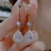 Brincos de cristal de moda de celebridades da Internet 2023 Nova moda elegante de alta qualidade para todos os jogos oco completo