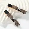 Popular Coreano Exquisito Perla Completo Strass Pequeño Pasador para el Cabello Brillante Dulce Lazo Pasador para el Cabello Pinza de Pato Pasador para el Flequillo