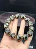 Venta al por mayor del fabricante Pulsera de cuentas Dzi de Xizang 16 mm Negra y Blanca Dzi Weathered B