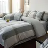 Nuevo Juego de Cuatro Piezas 2026 Algodón 100% Cepillado Sábana Funda de Almohada Funda Nórdica de Alta Densidad Juego de Tres Piezas Cálido Otoño e Invierno Ropa de Cama