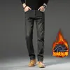 Jeans Casuales Cálidos de Moda Ajustados Rectos Elásticos Engrosados con Forro de Polar para Jóvenes Invierno 2026