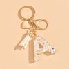 Llavero de Iniciales Accesorios para Mochila de Mujer Hebilla de Langosta Colgante Letras Inglesas Amor Borla Llavero Lindo Colgante