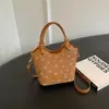 Bolsa de Ombro Nova de Bolinhas Outono/Inverno 2026 Bolsa Balde Simples para o Dia a Dia Bolsa para o Trabalho Bolsa de Mão Versátil Casual Bolsa de Ombro