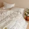 Conjunto de cuatro piezas bordado de algodón de fibra larga estilo francés, ultra suave, funda de edredón de algodón puro para todas las estaciones, ropa de cama hipoalergénica para dormir sin nada