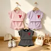 Nueva ropa para niñas de comercio exterior transfronterizo: conjunto de camiseta de rayas con top de lazo y shorts, conjunto sencillo de dos piezas de manga corta para niños