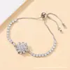 Pulseira Ajustável Flor de Lis Rotatória de Zircônia para Meninas, Personalidade, Luxo Leve, Design de Nicho, Joias de Mão Atacado