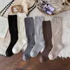 Calcetines para Mujer de Color Sólido a Media Pantorrilla Estilo Coreano Sensación Perezosa Calcetines para Pantorrilla Invierno Sensación de Pelo Largo Calcetines Abultados para Botas Calcetines para Mujer