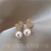 Diseño de nicho aretes de perla y circón retro francés de alta calidad lujo ligero estilo coreano elegante aguja de plata de ley aretes adorables