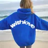 Sudadera con capucha de cuello alto informal de moda deportiva de moda para hombre y mujer de otoño e invierno con hombros descubiertos y talla grande para parejas