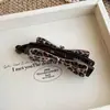 Presilha banana com laço estampa de leopardo estilo coreano para mulheres, novo modelo 2026, de alta qualidade e elegante, adequada para cabelos grossos, presilha vertical para rabo de cavalo alto