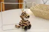 Colgante de León Juguete Pequeño de Peluche Muñeco de Animal Personalizado Colgante para Bolso Llavero de Rinoceronte Venta al por Mayor