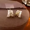 Brincos de tarracha redondos com zircônia banhados a ouro real, design europeu e americano de alta resistência, brincos da moda, brincos de nicho de alta qualidade para mulheres
