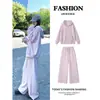 Conjunto de sudadera deportiva casual color púrpura en polvo para mujer 2026 nuevo estilo coreano otoño atuendo completo sensación de alta gama