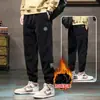 Pantalones cálidos de pana con forro polar engrosado para otoño e invierno para hombre, pantalones casuales bordados, modernos y versátiles