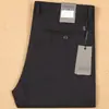 21 pantalones casuales de negocios rectos ajustados para hombre, gruesos, suaves, de fibra de poliéster microelástica, sin planchado, para otoño e invierno