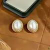 Pendientes Sencillos de Perlas Estilo Rugby con un Toque Elegante y de Alta Gama Estilo Hong Kong, Pendientes de Moda Ovalados con Aguja de Plata, Diseño de Nicho, Versátiles